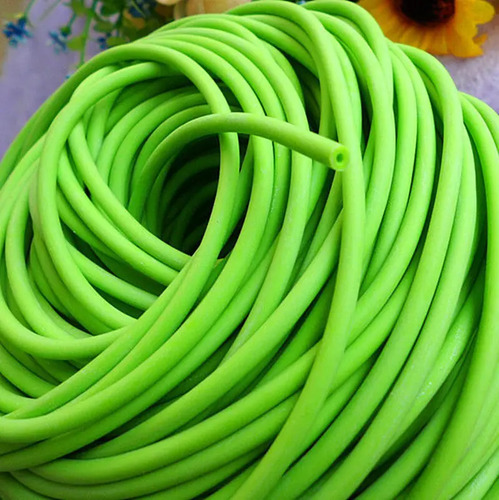 Bobina de goma elástica verde fluorescente para resortera, vista enrollada de frente