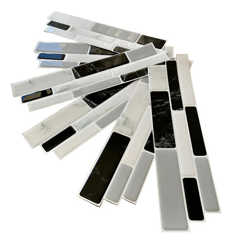 Muestras de guardas autoadhesivas 3D en blanco, gris, negro, azul y texturas marmoleadas dispuestas en abanico