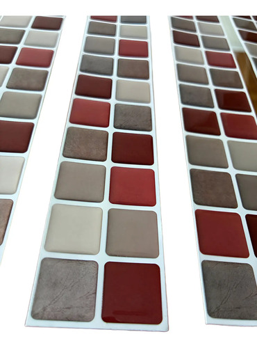 Muestrario de guardas autoadhesivas 3D para baño y cocina con muestras de diferentes colores y texturas